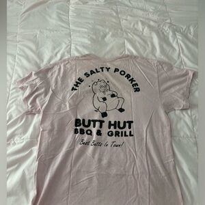 graphic tee shirt with pig on it.